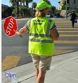 Person holding up a stop sign